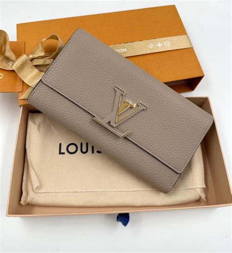 louis vuitton capucines wallet review|louis vuitton vertical wallet.